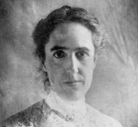 white woman in high collared blouse
